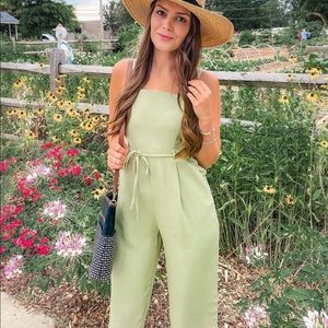 Small, Green Jumpsuit with tie waist.